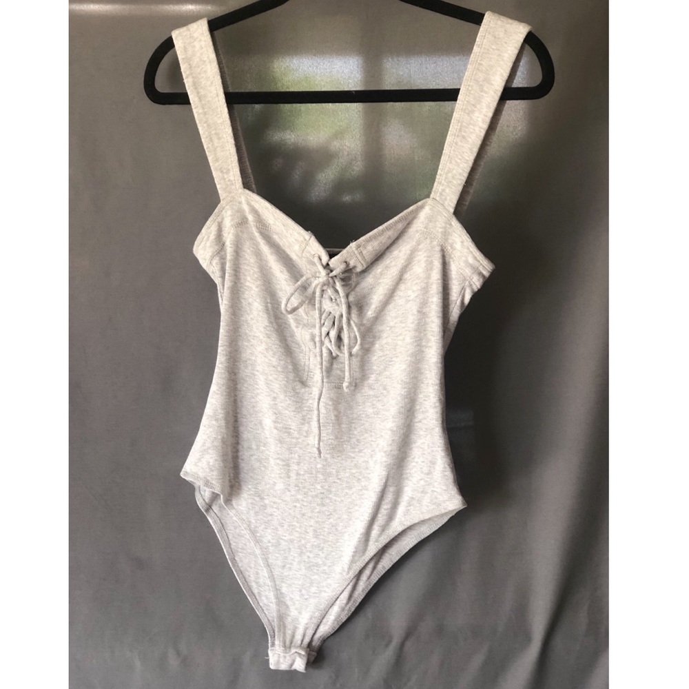 Grey bodysuit by Olivaceous